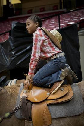 Girl Kneeling on Horse’s Back, Birmingham, AL, 2016 [Black Cowboys (and Girls) series]